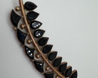 Vintage brass tone black faux gem abstract design brooch