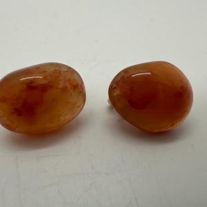 Vintage gold tone and round orange gemstone clip on earrings