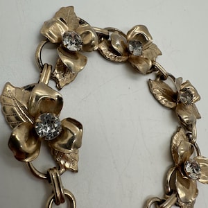 Vintage gold tone rhinestone flower link bracelet