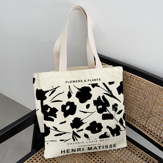 White bag with black flowers hotsell