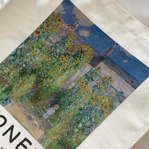 May include: A tote bag with a painting of a garden with sunflowers and a blue sky. The painting is in a painterly style with visible brushstrokes. The bag is white with the word "ONE" printed on the bottom left corner.