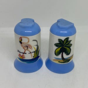 Vintage plastic tiki salt and pepper shaker set Florida keys souvenir