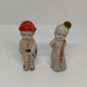 Vintage penny dolls 2” set of two bisque doll figurines Japan