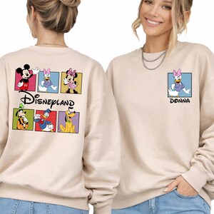 May include: A set of three ceramic mugs with a speckled, matte finish. The mugs are in shades of cream, light gray, and dark gray. Each mug has a simple, minimalist design and a rounded handle.