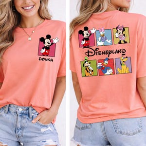 May include: A set of three ceramic mugs with a speckled, matte finish. Each mug features a different color: light blue, cream, and gray. The mugs have a simple, modern design with a rounded shape and a comfortable handle.