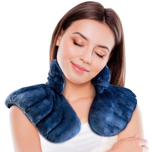 May include: A blue plush neck and shoulder wrap. The wrap is designed to be worn around the neck and shoulders for comfort and warmth.
