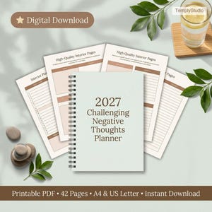 May include: A light green 2027 planner with the text "Challenging Negative Thoughts Planner" and several open pages. The planner is spiral-bound and surrounded by loose pages with interior planning layouts. The words "Digital Download" are at the top.