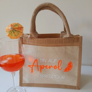 Jute bag Aperol Spritztour, bag Aperol Spritz Tour, gift bag for drinks, Aperol saying in white & neon orange