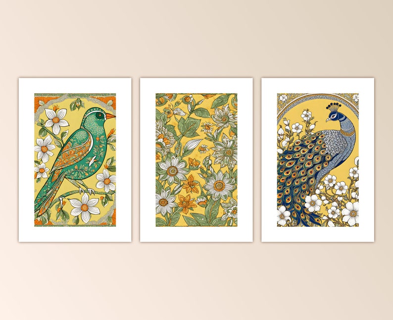May include: Three framed prints with a yellow background and floral designs. The left print features a green bird with a yellow beak and white flowers. The center print features white and yellow flowers with green leaves. The right print features a blue peacock with a yellow beak and white flowers.