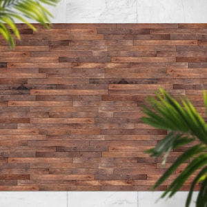 Può includere: Un primo piano di un muro di legno marrone con un motivo di assi orizzontali. Le assi di legno sono disposte in uno schema sfalsato, creando un aspetto rustico e naturale. Il legno è di un colore marrone intenso con alcune variazioni più scure e più chiare.