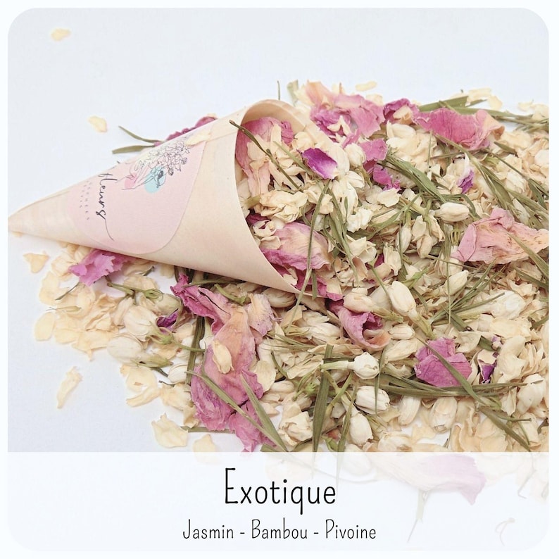 May include: A light beige paper cone filled with a mixture of dried flower petals and green grass-like stems. The cone features a pink circular label with a floral illustration and the text "Exotique Jasmin - Bambou - Pivoine" printed below.
