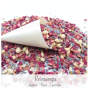 May include: A cream-coloured paper cone filled with a mixture of dried pink rose petals, purple lavender buds, and small white jasmine flowers. The text "Printemps" and "Jasmin - Rose - Lavande" is printed in black at the bottom of the image.