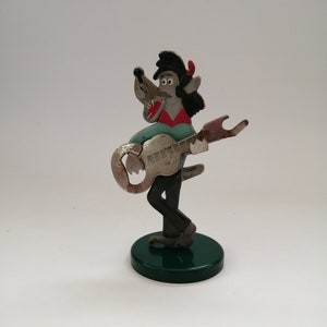 Radziecka popularna kreskówka „Cóż, poczekaj!” Hero Wolf - otwieracz do butelek z korkiem z blachy aluminiowej, okrągły, prosty, ZSRR, rocznik Nu Pogodi 1980 R-8