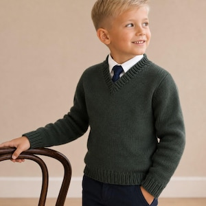 May include: A dark forest green V-neck long-sleeve sweater with a ribbed collar, cuffs, and hem. The sweater is worn over a crisp white collared shirt with a solid navy blue necktie and paired with dark navy blue trousers.