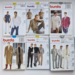 May include: Six Burda sewing pattern envelopes showcasing men's fashion designs. The patterns include shirts, jackets, coats, and trousers. The envelopes display images of the finished garments and include size information.
