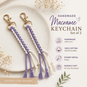 May include: Two macrame keychains featuring alternating purple and white cotton cord knots, each attached to a gold-toned metal lobster clasp. The text on the image reads: HANDMADE Macrame KEYCHAIN Set of 2, HANDMADE with Love, 100% COTTON Soft & Durable, STURDY METAL Clasp, PERFECT GIFT for Any Occasion, Handcrafted. Stylish. Meaningful.