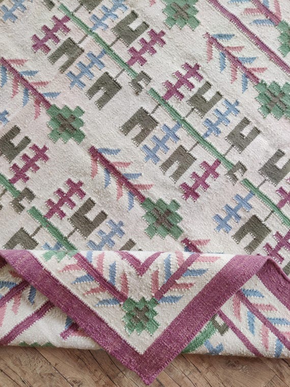 幾何学模様 ウールラグ 166x96幾何学模様のウールラグ 手織り絨毯