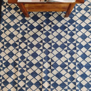 cotton wool rug, handwoven with a striking geometric design. Perfect for modern, coastal, or transitional interiors, this flatweave rug blends the softness of wool with the durability of cotton. Ideal for living rooms, bedrooms, or offices, it brings timeless style and comfort. Lightweight, reversible, and easy to maintain. Custom sizes available for designers and home decorators.