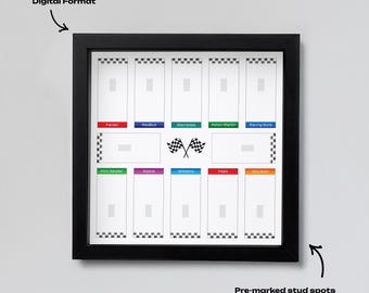 May include: Black framed display board with ten rectangular photo slots, each labeled with a Formula 1 team name. The board includes the text "25 x 25 High Quality Digital Format" and "Pre-marked stud spots for perfect display alignment."