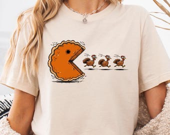Funny Thanksgiving Shirt: Pumpkin Pie Pacman Chasing Turkey Tee