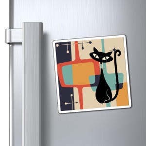 May include: A black cat with white eyes stands in front of a colorful geometric pattern. The pattern features shades of orange, red, blue, and green. The cat is in a mid-century modern style.