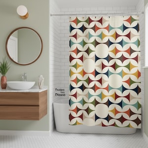 May include: A colorful shower curtain with a retro geometric pattern in shades of cream, blue, green, orange, and brown. The curtain hangs in a bathroom with a white tub and a wooden vanity. The text "Designs with Dianna" is visible.