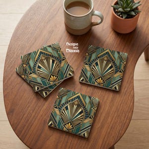 May include: Three square coasters featuring a geometric fan pattern in shades of teal, dark green, gold, and black. The coasters display the text Designs with Dianna. The design consists of symmetrical lines and shapes arranged in a repeating motif.