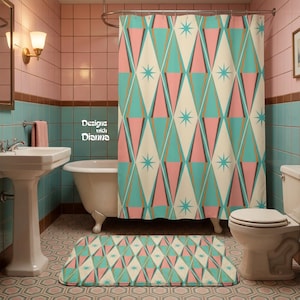May include: A shower curtain and matching bath mat featuring a repeating geometric pattern of diamonds in shades of pink, teal, and cream, accented with small starburst shapes. The text "Designs with Dianna" is printed on the shower curtain.