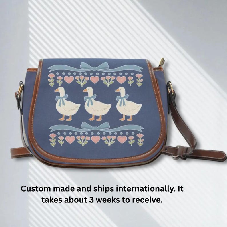 silly goose purse with ribbon detail and floral patterns, adds charm to any everyday outfit