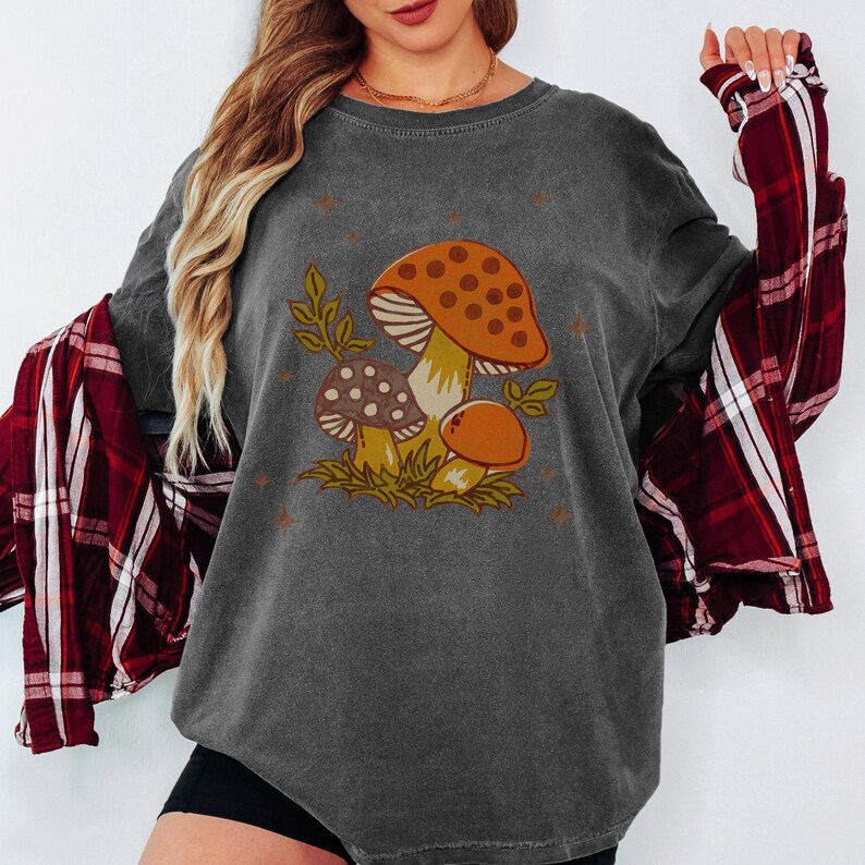Merry mushroom tee for women with retro print, soft cotton fabric, ideal for music festivals or farmers market strolls 🍄