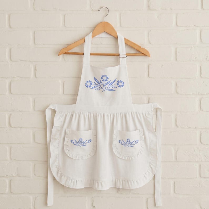 corningware apron,corningware gift,blue cornflower apron,vintage corningware,retro kitchen apron,corningware decor,farmhouse apron,blue floral apron,corningware style,retro cooking apron,vintage kitchen apron,cornflower apron gift,classic kitchen decor,corningware kitchen,blue kitchen apron,retro homemaker apron,corningware lover gift,vintage apron blue,floral apron vintage,retro kitchen gift