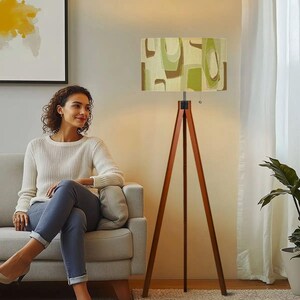Vintage-inspired tripod floor lamp adding warm ambient lighting and retro style to any home.