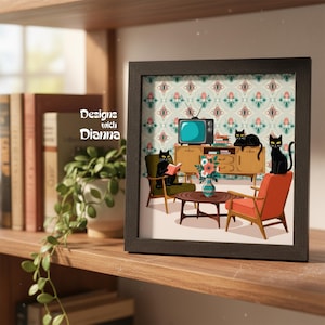May include: A framed print featuring a retro living room scene with black cats. The illustration includes a teal television, a wooden cabinet, and mid-century modern furniture. The print is labeled "Designs with Dianna".