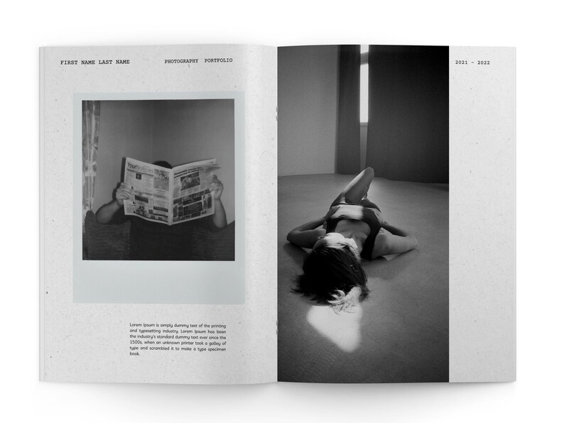 May include: A black and white photography portfolio featuring two images. The first image shows a person reading a newspaper. The second image shows a person lying on the floor with a beam of light shining on them. The text "2021 - 2022" is printed on the page.