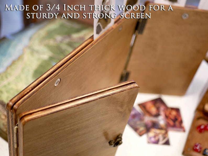 May include: Close-up of a wooden game screen made of 3/4 inch thick wood. The screen is folded and has a hinge. The text "MADE OF 3/4 INCH THICK WOOD FOR A STURDY AND STRONG SCREEN" is visible on the screen.