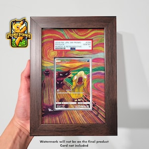 Peut inclure: Carte Pokémon Psyduck encadrée de la série Munch: A Retrospective. L'œuvre présente un Psyduck jaune dans une parodie de "Le Cri" d'Edvard Munch. Le cadre est de couleur marron foncé.