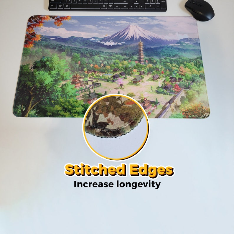 May include: A large rectangular mouse pad with a colorful image of a mountain range and a village. The mouse pad has stitched edges to increase longevity.
