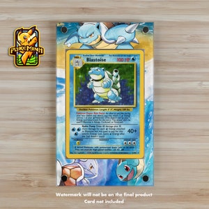 May include: A Blastoise Pokémon card, featuring a blue turtle-like creature with a shell, displayed in a clear acrylic case. The card has text including "Blastoise" and "100 HP". The card is 5' 3" long and weighs 189 lbs.