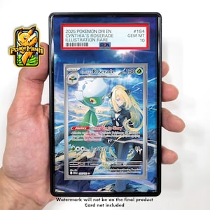 May include: A graded Pokémon card featuring Cynthia's Roserade illustration. The card is encased in a black holder with the text "2025 Pokemon Dri En Cynthia's Roserade Illustration Rare" and a PSA grade of 10. The card art depicts a female character and a Roserade.