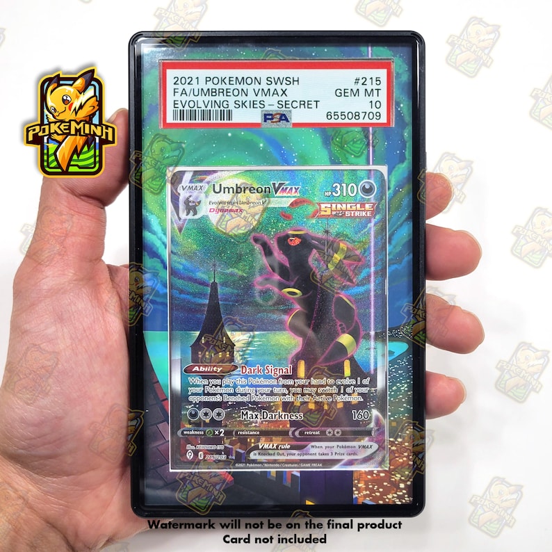 May include: A PSA graded 2021 Pokemon SWSH #215 Umbreon VMAX Evolving Skies Secret trading card in a black plastic slab. The card features a black Umbreon character with glowing pink outlines against a dark, starry night sky and a tall tower.