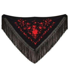 May include: A triangular black shawl featuring vibrant red floral embroidery centered on the fabric. The edges of the shawl are finished with long, thin black fringe that hangs down from the two angled sides, creating a decorative border.