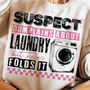 Suspect Complains About Laundry But Never Folds It Png, Suspect Trendy Png, Trending Png, Preppy Digital Download, Pink Coquette Design