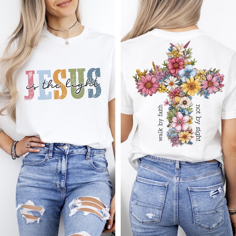 May include: White t-shirt with the text "JESUS is the light" in colorful letters. The back of the shirt features a floral cross design with the text "walk by faith, not by sight".