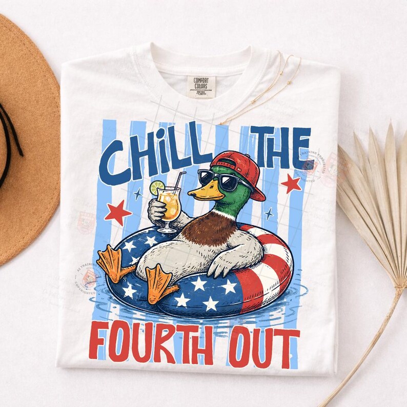 May include: White t-shirt with a graphic of a duck wearing sunglasses and a red cap, relaxing on a patriotic float with a cocktail. The text reads "Chill the Fourth Out" in blue and red.