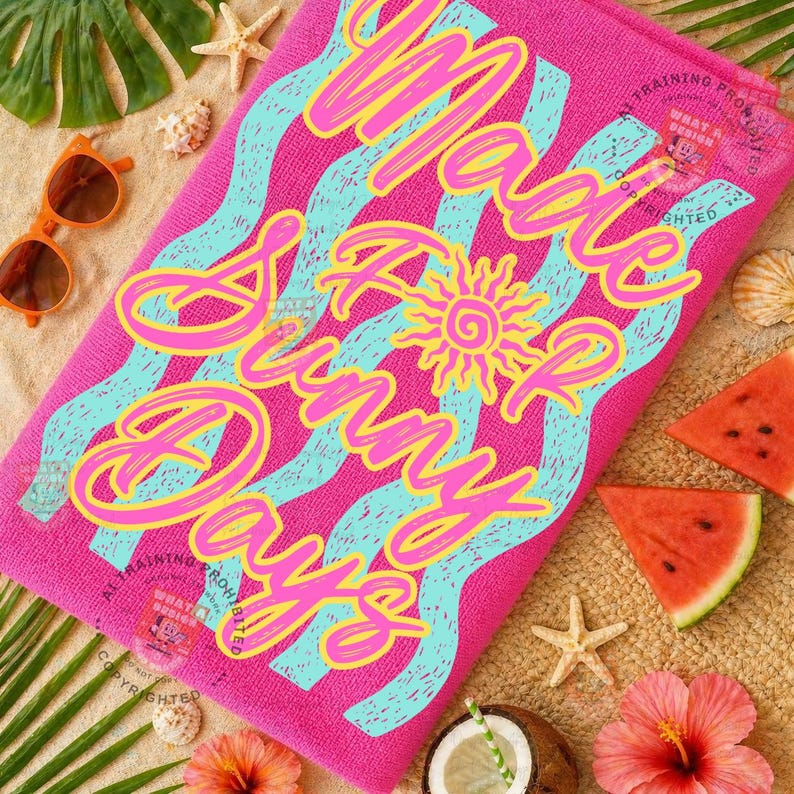 May include: A bright pink beach towel with the words "Make Sunny Days" in a wavy design. The text is in yellow and pink, with blue wavy lines. The towel is surrounded by beach-themed items like sunglasses, watermelon, and seashells.