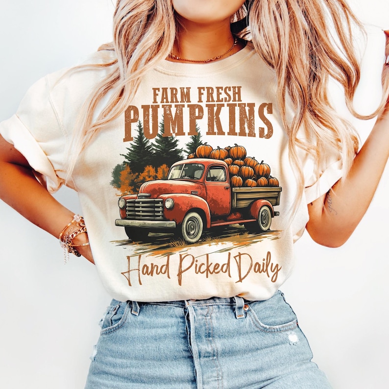 Digital Farm Fresh Pumpkins PNG design featuring a vintage truck loaded with pumpkins, 'Hand Picked Daily' text.
