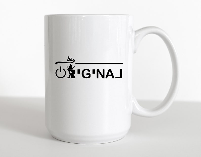 May include: White ceramic mug with a black design that says "be original" with a crown and power button graphic.
