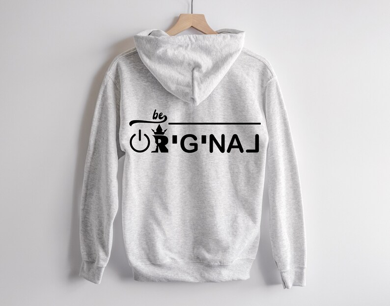 May include: Gray hooded sweatshirt with a black graphic on the back that says "be original" with a crown and power button symbol.