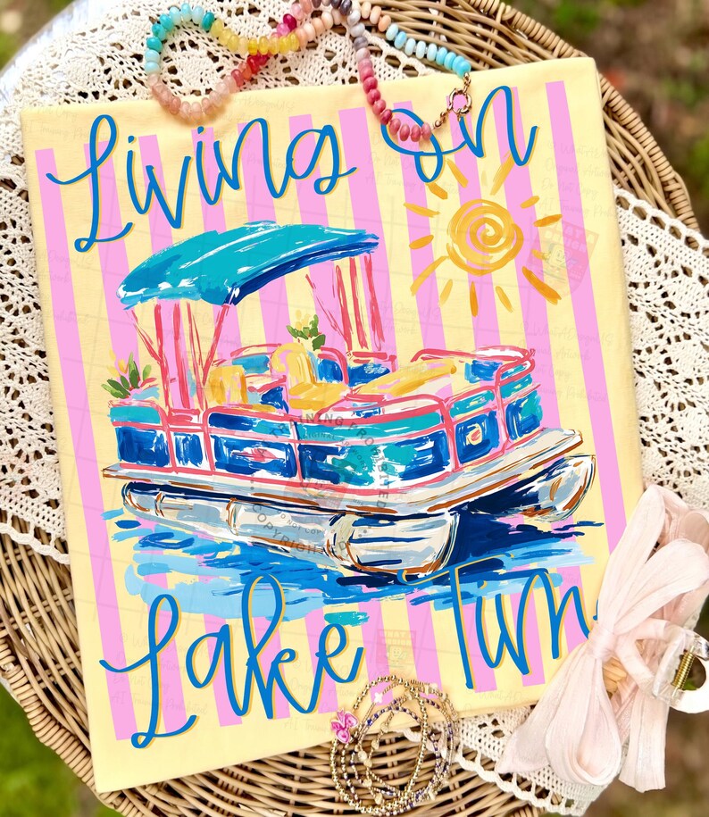 May include: A canvas art piece with a yellow background and pink vertical stripes. The artwork features a blue and white pontoon boat with the words "Living on Lake Fun" in blue script. A yellow sun is in the upper right corner.