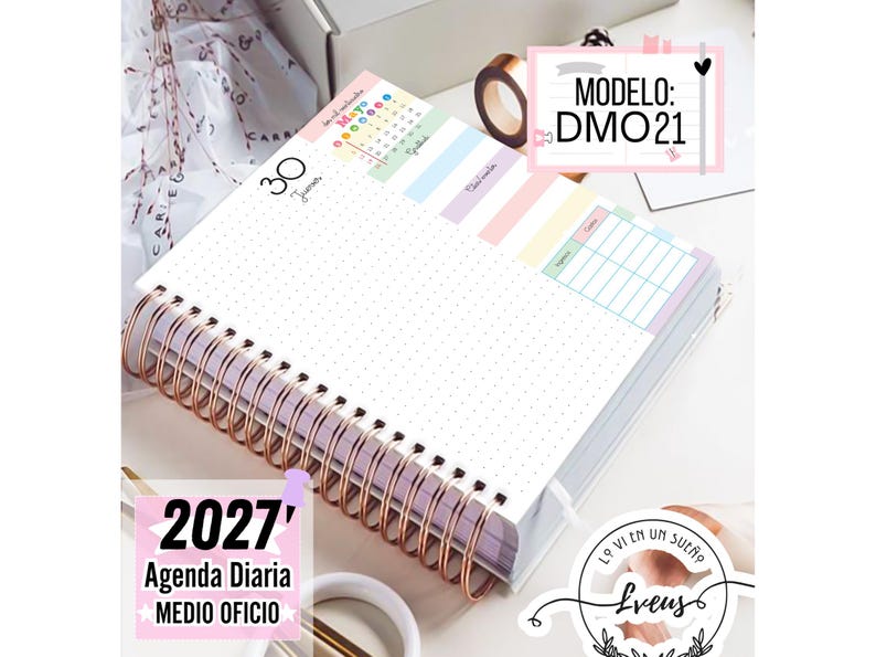 May include: A 2027 daily planner with a copper-colored spiral binding. The open page features a dotted grid layout, a small calendar for May, and pastel-colored sections for notes and expenses. Text on the page includes 30 Jueves, 2027 Agenda Diaria MEDIO OFICIO, and MODELO: DMO21.